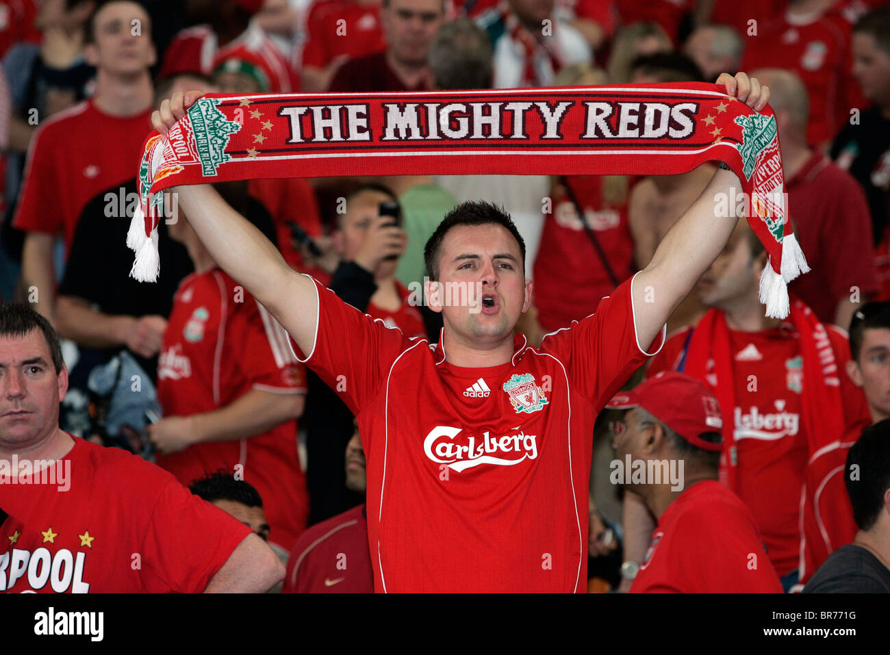Name:  a-liverpool-football-fan-holds-up-a-scarf-in-the-stands-during-a-match-BR771G-1844285587.jpg
Views: 610
Size:  181.2 KB